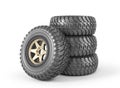 Off road wheels stacked on a white background. Royalty Free Stock Photo