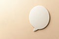 Off-White Speech Bubble on Paper Background for Effective Communication Element Royalty Free Stock Photo