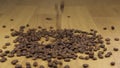 ÃÂ¡offee beans falling on a pile of coffee beans