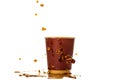 ÃÂ¡offee splash in paper coffee cup isolated on white background.