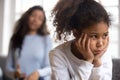 Offended African American preschooler girl looking in distance Royalty Free Stock Photo