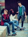 Offended boy and couple of teens apart Royalty Free Stock Photo