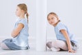 Offended girl and twin sister Royalty Free Stock Photo