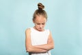 Offended hurt child fold hands cute huffy girl Royalty Free Stock Photo