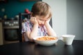 Offended little boy refuses to eat dinner Royalty Free Stock Photo