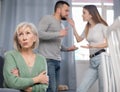 Offended mother dont speaking with adult children during home quarrel