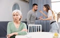 Offended mother dont speaking with adult children during home quarrel