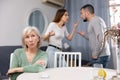 Offended mother dont speaking with adult children during home quarrel