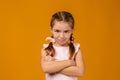 Offended sad little child girl in dress Royalty Free Stock Photo