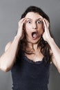 Offended young woman shouting, expressing jaw dropping surprise Royalty Free Stock Photo