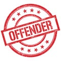 OFFENDER text written on red vintage stamp Royalty Free Stock Photo
