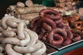 Offer semi-finished of pigs - sausage, blood sausage, white pudding Royalty Free Stock Photo