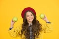 Offering healthy food in school. Happy child hold apples yellow background. Healthy school snack. Dieting plan for