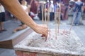 Offering of Joss Sticks in Penang Temple