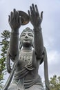 Offering from one of the six devas surrounding the Big Buddha at Ngong Ping, Lantau Island Royalty Free Stock Photo