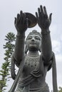 Offering from one of the six devas surrounding the Big Buddha at Ngong Ping, Lantau Island Royalty Free Stock Photo