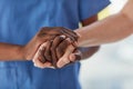 Offering a patient the care and comfort they need. Closeup shot of a medical practitioner holding a patients hand in Royalty Free Stock Photo