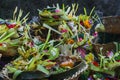 Offering to Hindu Gods in Bali island which called Canang and made from leaves and flowers Royalty Free Stock Photo