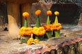 offerings at a buddhist altar at mount phou si in luang prabang (laos)