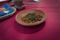 The offerings flower served on plate made from clay on top of red table photo taken in Pekalongan Indonesia