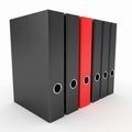 Office binders and one different red ring binder Royalty Free Stock Photo