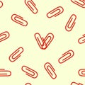 Pattern, delicate pale yellow background, red paper clips are scattered.