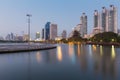 Office building city view in public park during twilight Royalty Free Stock Photo