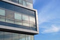 Office building corner white and blue financial commercial scyscraper facade