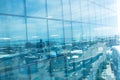 Office building exterior with reflection of city against sky Royalty Free Stock Photo