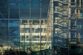 Office building glass facade bathed with sun Royalty Free Stock Photo