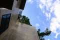 Office building and green tree over blue sky Royalty Free Stock Photo