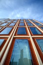 An office building in London with red bricks and blue windows Royalty Free Stock Photo