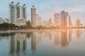 Office building over water lake reflection in public park Royalty Free Stock Photo