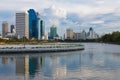 Office building with reflection over lake in public park Royalty Free Stock Photo