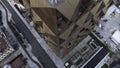 Office building windows and aerial view of skyscraper building. Stock footage. Bronze glass facade high rise building.