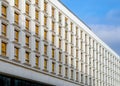 Office building windows background. Rectangular windows texture on a modern building facade. Royalty Free Stock Photo