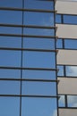 Office building windows reflecting the sky and clouds Royalty Free Stock Photo