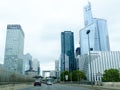 Office Buildings and Busy Street in Financial District, Paris, France. Royalty Free Stock Photo