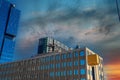 Office buildings and skyscrapers in the skyline of the city with blue sky and powerful red clouds at sunset in downtown Atlanta Royalty Free Stock Photo