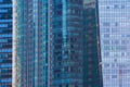 Office buildings windows. Blue glass architecture facade design with reflection of sky in urban city, Downtown Singapore City in Royalty Free Stock Photo