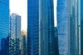 Office buildings windows. Blue glass architecture facade design with reflection of sky in urban city, Downtown Singapore City in Royalty Free Stock Photo