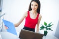 Office Business Woman Smiles and Holding Folder with Diagrams. W Royalty Free Stock Photo