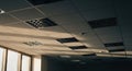office ceiling with recessed lights and sunlight Royalty Free Stock Photo