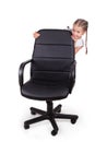 Office chair office chair and little cheerful girl isolated on white background. Modern adjustable chair from black Royalty Free Stock Photo