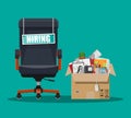 Office chair, sign vacancy, box with office itmes