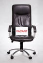 Office chair with vacancy sign