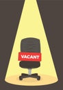 Office chair with a vacant sign under a spotlight. Business hiring and recruiting concept Royalty Free Stock Photo