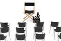 Office Chairs in front of Cinema Director Chair, Movie Clapper a