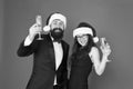 Office christmas party. merry christmas and cheers everyone. business man and girl drink champagne. xmas party. formal Royalty Free Stock Photo