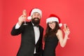 Office christmas party. merry christmas and cheers everyone. business man and girl drink champagne. xmas party. formal Royalty Free Stock Photo